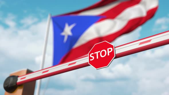 Opening Boom Barrier with Stop Sign at the Puerto Rican Flag alt