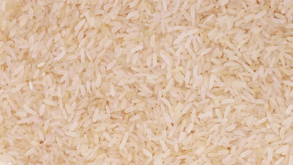 Raw Brown Rice Closeup Rotation Slow Mo