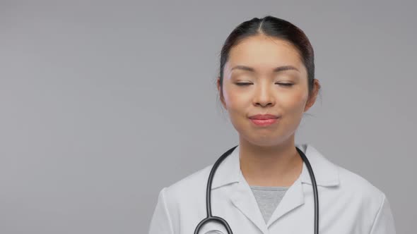 Happy Smiling Asian Female Doctor with Stethoscope alt