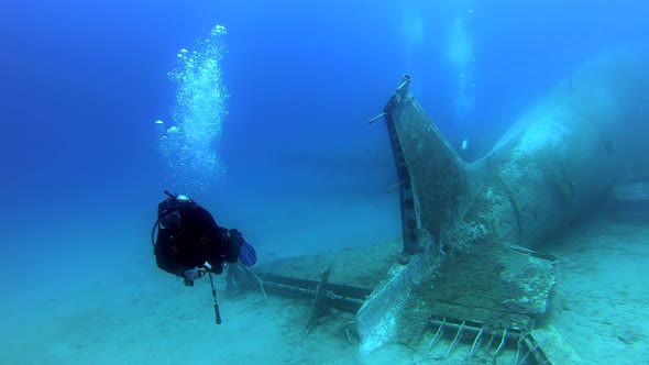 Wreckage Of Sunken Old War Plane Underwater Sea