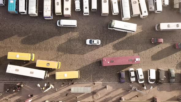 Aerial Footage of Many Cars and Buses Moving on a Busy City Street alt