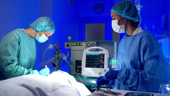 Surgeon Doing Surgery in Operating Room in Hospital