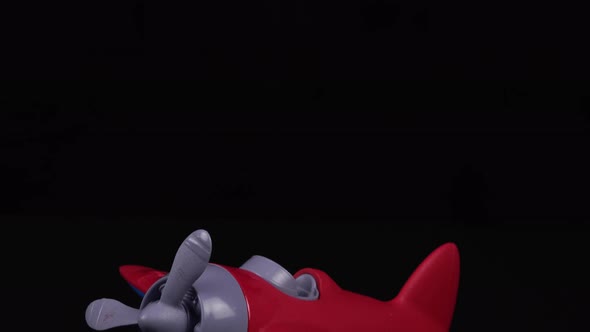 Red Toy Airplane Tilt Down alt