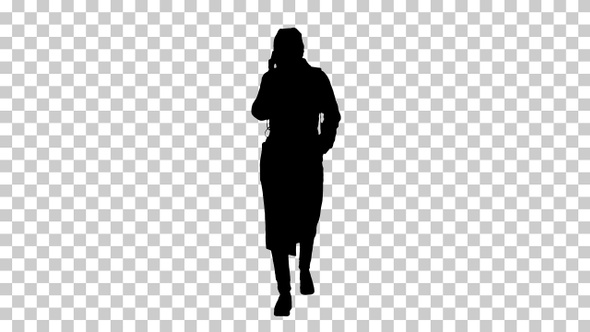 Silhouette woman walking and talking by mobile phone Alpha Channel alt