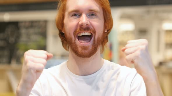 Happy Redhead Beard Man Celebrating Success alt