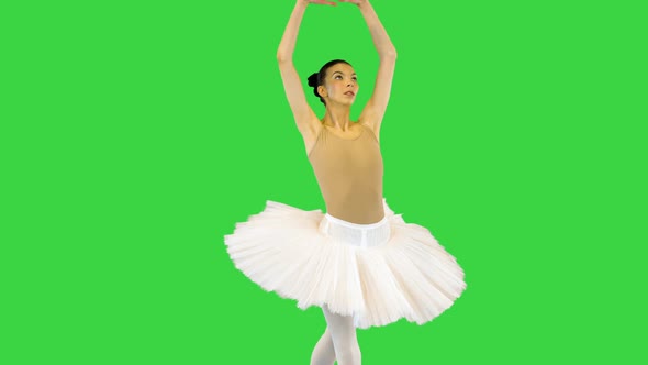 Young Ballerina Makes Some Ballet Movements and Runs Away on a Green Screen Chroma Key