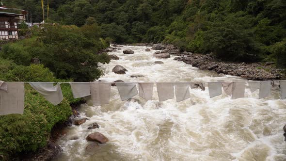 Raging river in the mountains of Bhutan alt