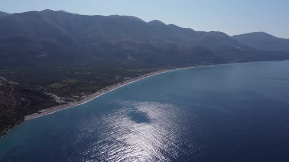 Beautiful Coastline of South Albania with Hills and Mountains Above Blue Azure Sea alt