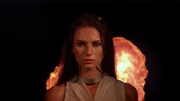 Woman and flames, ultra slow motion alt