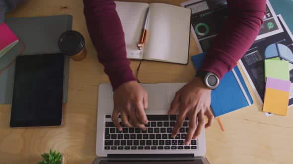 View from above of woman working in creative office alt