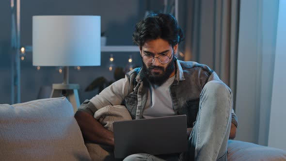 Thoughtful Arabian Guy Male Freelancer Indian Bearded Adult Man Thinking of Computer Project Problem alt