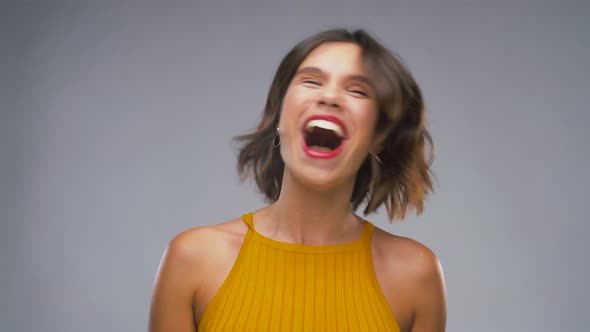 Happy Young Woman Shaking Head alt