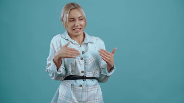 The Unwell Insecure Young Woman Shows Her Stop Sign with Her Hands alt
