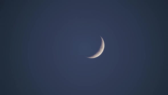 8K Thin Crescent Moon Moonset in Cloudless Sky