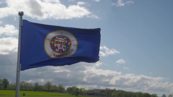 Flag of Minnesota State Region of the United States Waving at Wind alt
