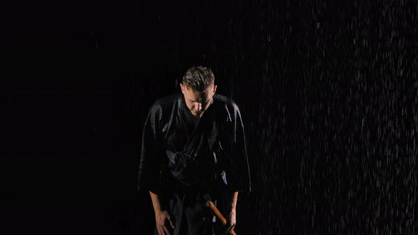 Japanese Kendo Fighter in Fighting Stance Holding your Shinai alt