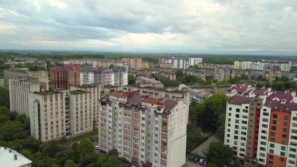 Aerial view of city residential area with high apartment buildings. alt