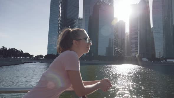 Woman Enjoying View of Downtown Singapore
