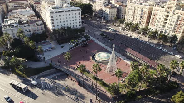 Top down view Historic Plaza marina with fountain, orbiting motion. Malaga