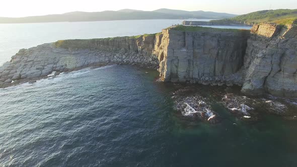 Drone View of a Beautiful Peninsula Tobizina with Vertical Cliffs at Sunset alt