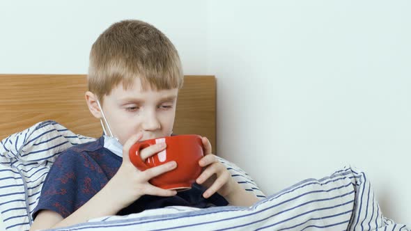 Child Drinks a Liquid alt