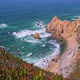 Footage Praia Do Ursa Beach with Beautiful Orange Colored Cliffs on Atlantic Ocean Coast Near - VideoHive Item for Sale