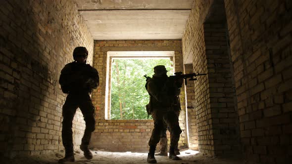 Squad Sneaking Up To Enemy in Occupied Building, Stock Footage | VideoHive