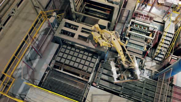 Timelapse of a Robotic Arm Transporting Ceramics. Modern Automated Factory Equipment. alt