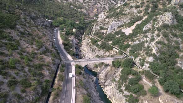 Aerial View of an Ancient Stone Bridge Called Devil's Bridge in South of France alt