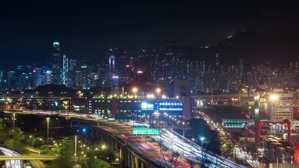 City Skyline Views at Night of the Hong Kong Downtown Core Headlights of Car Traffic alt