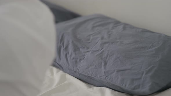 Young Man Going to Bed Sleeping alt