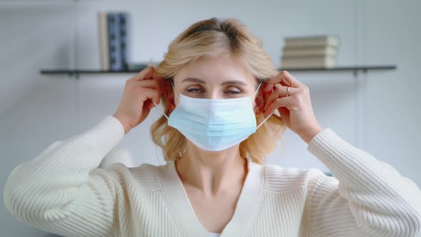 Young woman wearing a face mask against air pollution and covid19 coronavirus alt