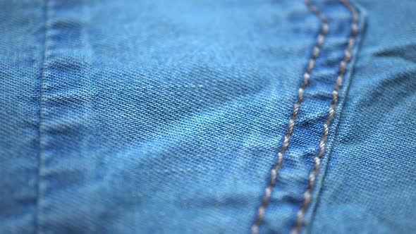Blue Denim Fabric Texture And Stitching alt