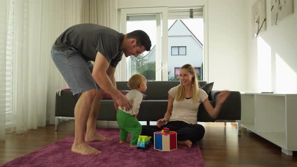 Young Family Moving to Music alt