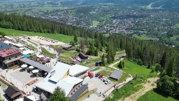 Flight over Gubalowka funicular railway above Zakopane town in Tatras, Poland alt