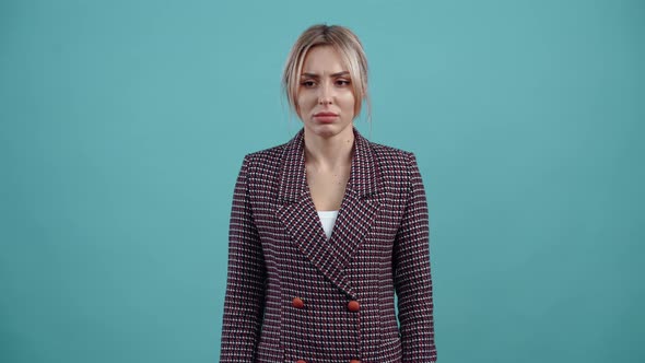 The Grieving Young Woman Pulls Her Hair Aside Begins to Cry Puts Her Hands to Her Face Trying to alt