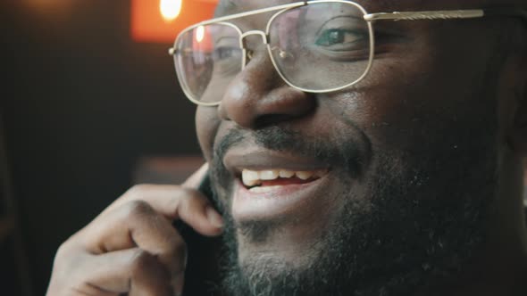 African American Man Speaking on Mobile Phone alt