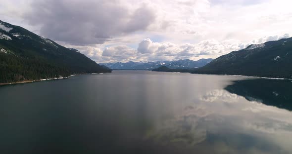Frozen Lake To Snowmelt Bright Reflection Winter Mountain Landscape alt
