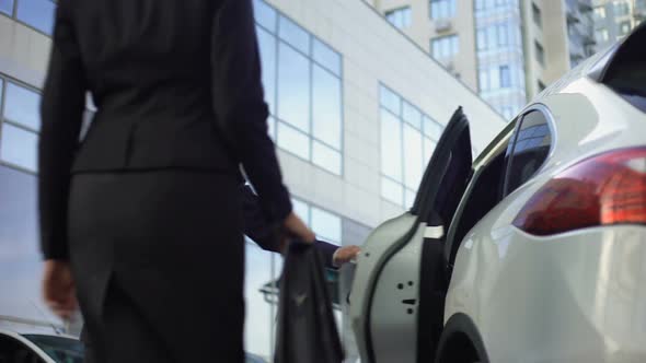 Personal Driver Meeting and Opening Car Door for Lady Boss, Bodyguard Duties alt