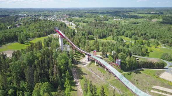 Idyllic Drone Point of View of a Ski Jumping Tower in Estonia on a Sunny Day