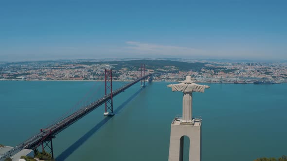 Drone shot of of Statue Santuario De Cristo Rei, Lisbon Portugal 4K
