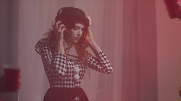 Young Woman DJing at House Party on Halloween alt