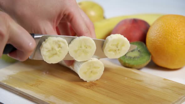 Woman Hands Peeling Banana Close Up Video