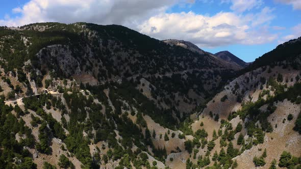  Fly over Gorge Canyon and Tunnel in Greece. Aerial landscape of Mountains  alt
