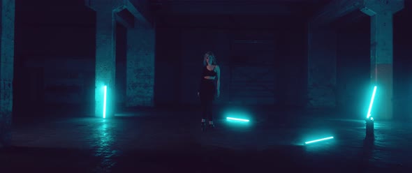 Female Dancer in a dark Parking Lot with Neon Lights alt