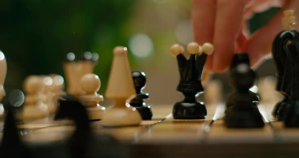 Cinematic Close Up to Hands Playing Chess