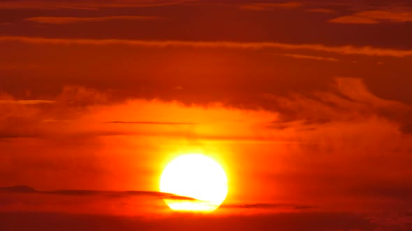 Big Sun with Clouds Sunrise Timelapse