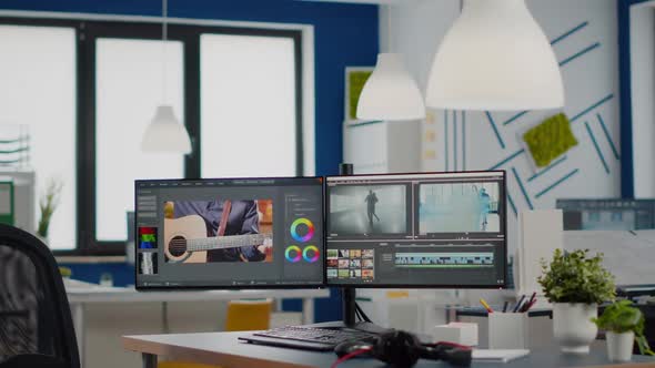 Empty Modern Creative Agency Office with Dual Monitors Setup alt