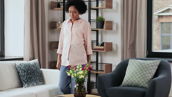 Happy Smiling Woman with Smartphone at Home alt