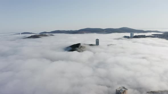 City Covered with Morning Mist alt